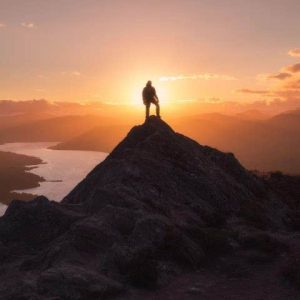 Person on top of a peak
